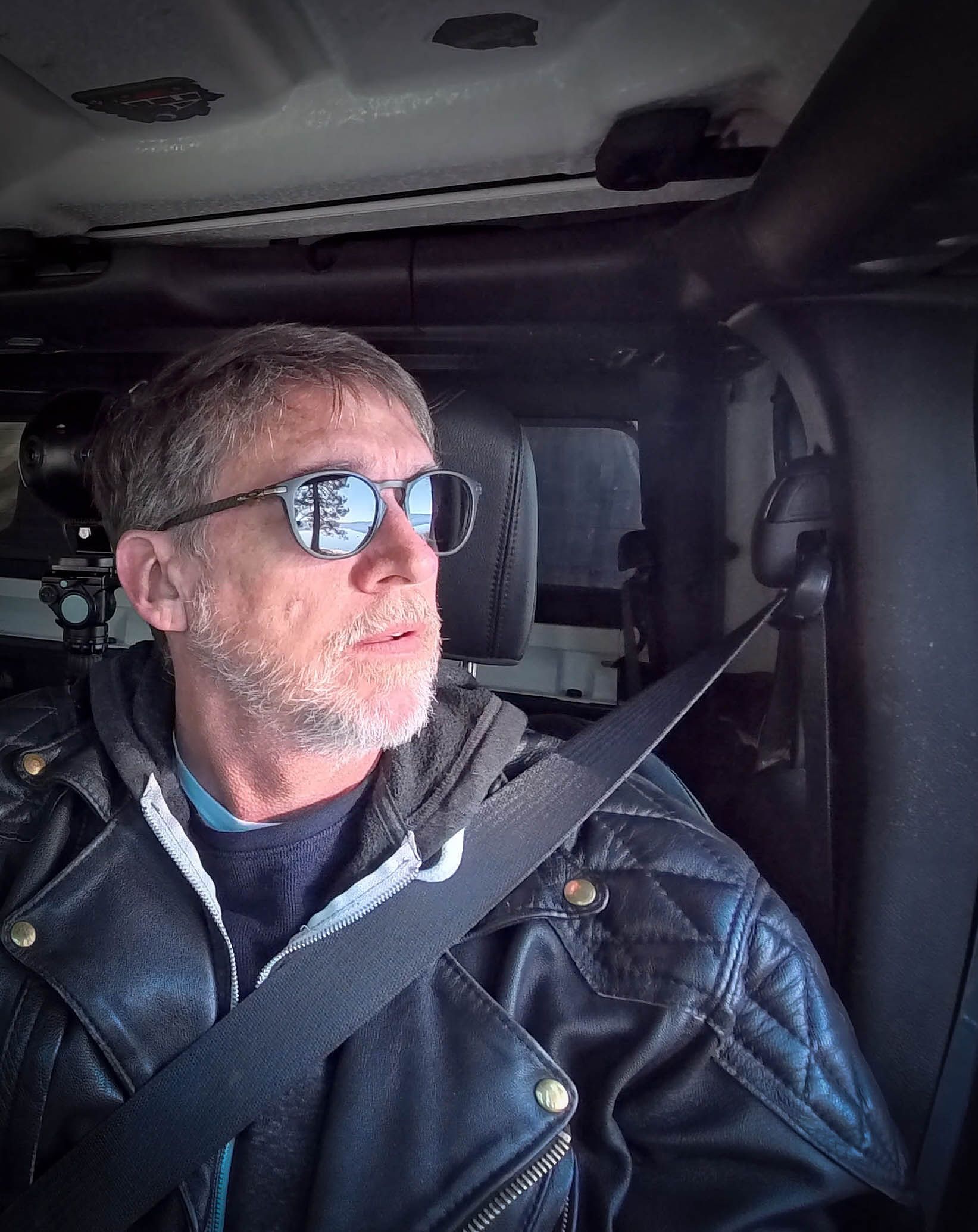 Jiva DeVoe behind the wheel of the green jeep